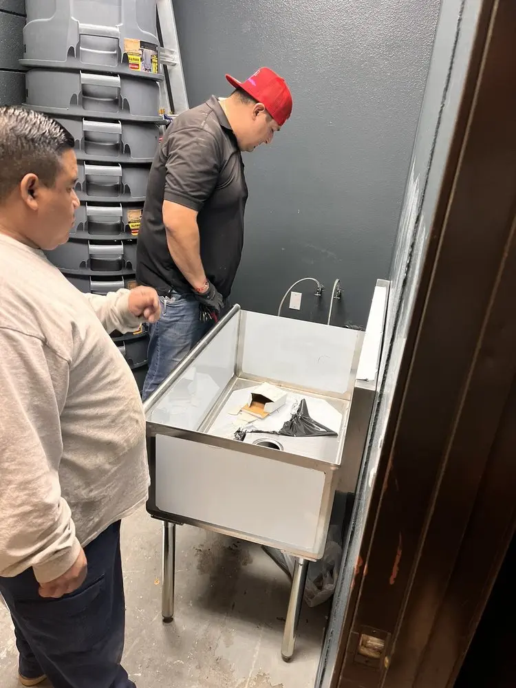Commercial plumbing and sink installation in Sanger